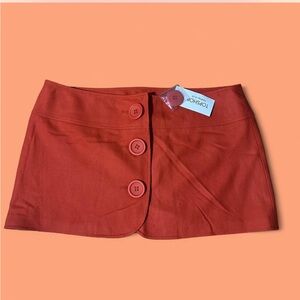 SOLD!!!!! TOPSHOP- burnt orange mini button skirt
